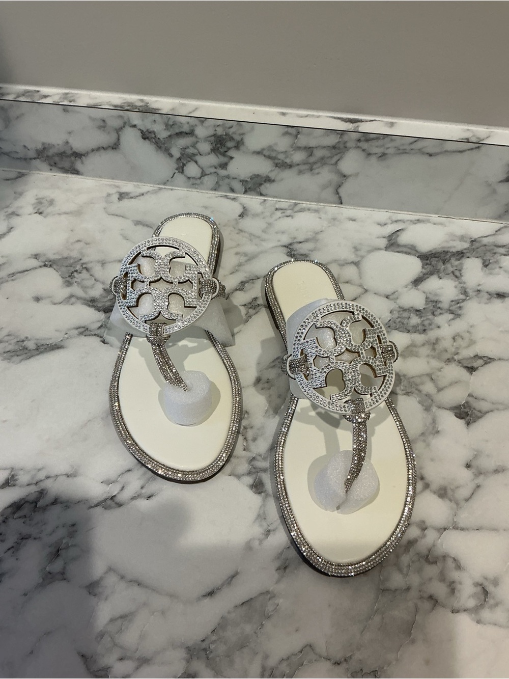 Tory Burch White and Silver Crystal Logo T‑Strap Sandals